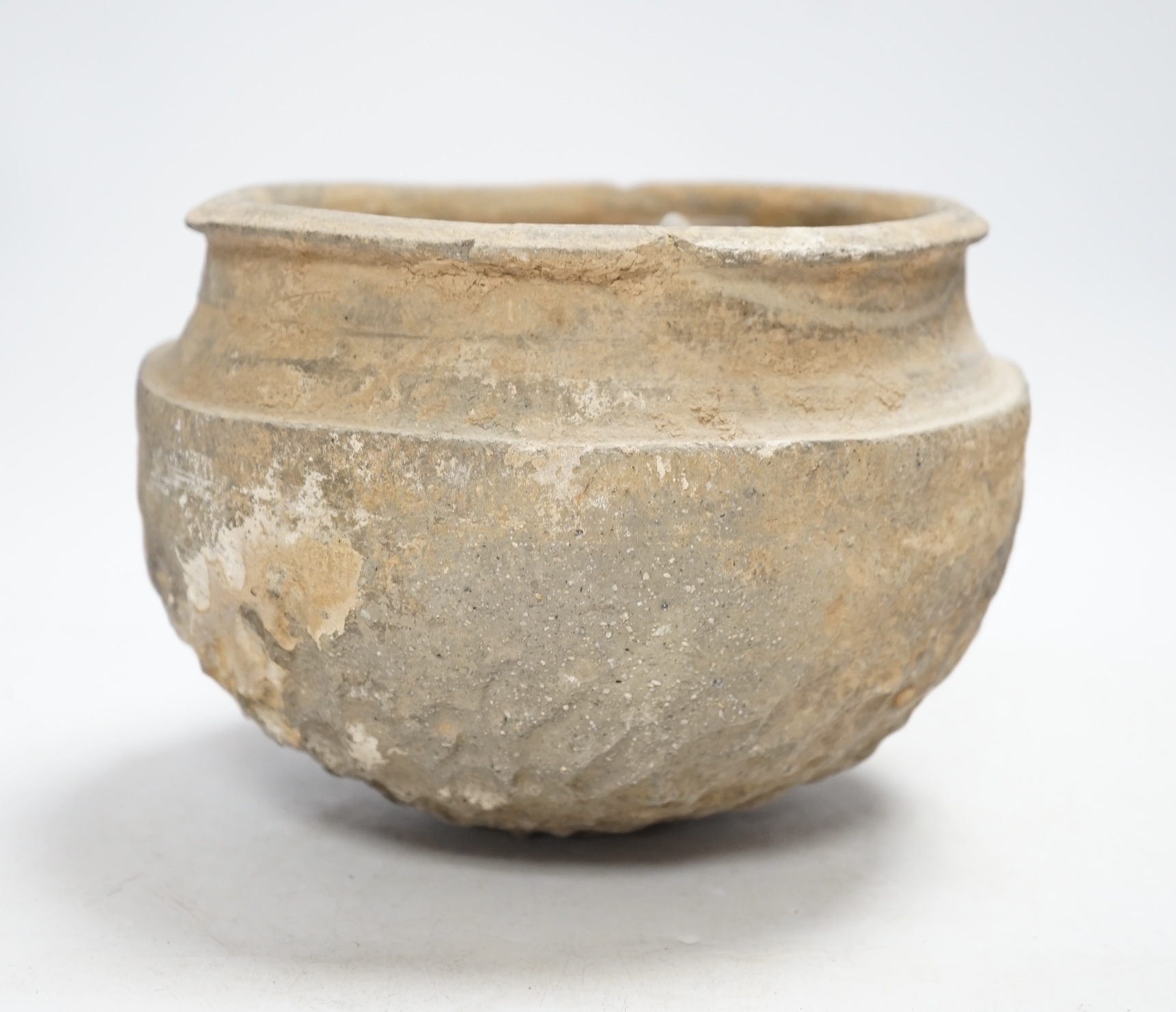 A Chinese grey pottery bowl, probably Warring States, 19cm diameter